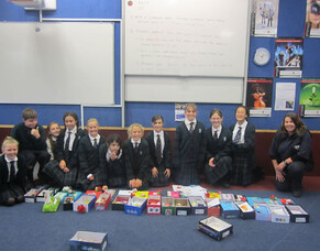 Aquinas College Juniors give back to the SPCA volunteers